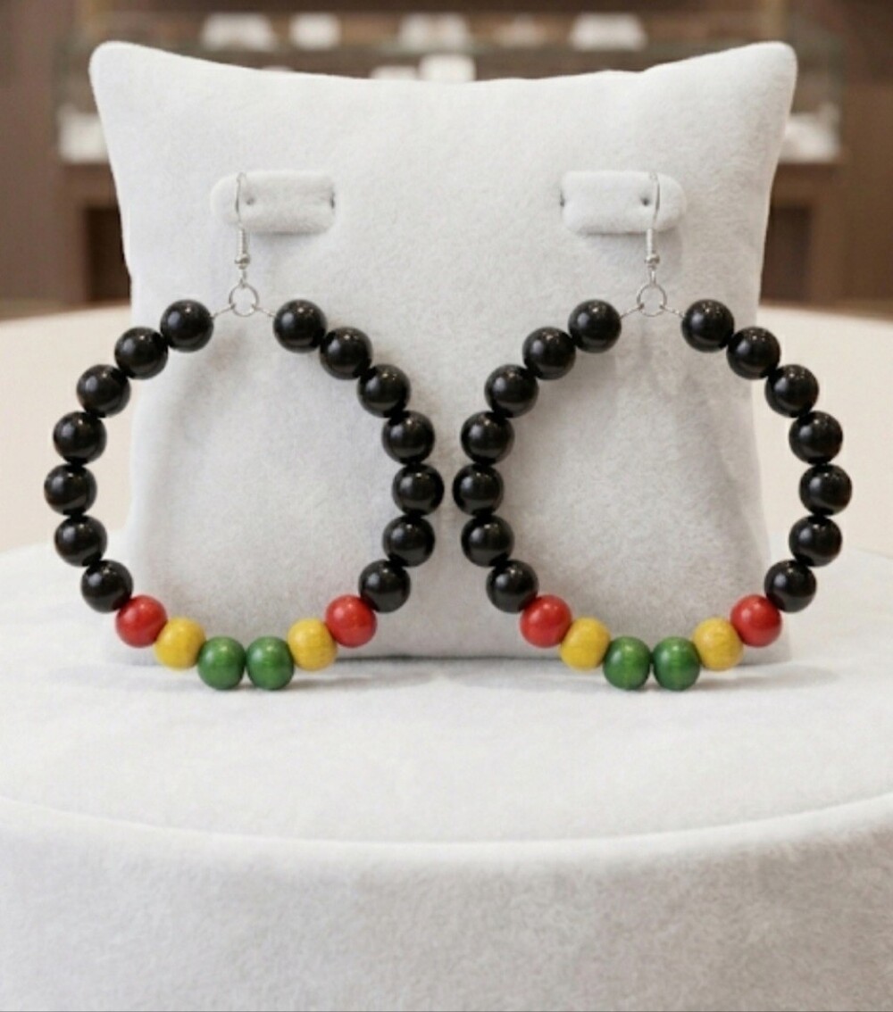 Elegant hoop earrings featuring Black and multicolored wooden beads. Their light - Picture 7 of 7